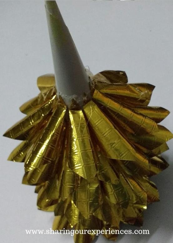 christmas tree with gold papercones