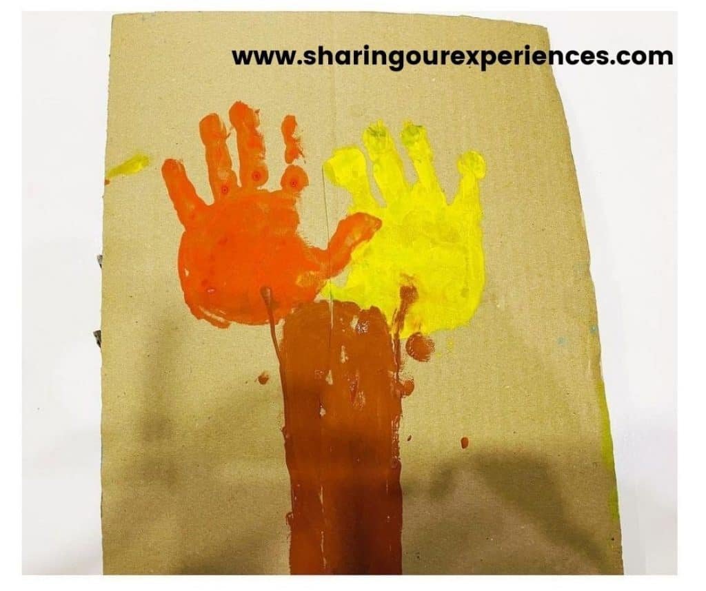 Hand impression for color Holi activity for toddlers